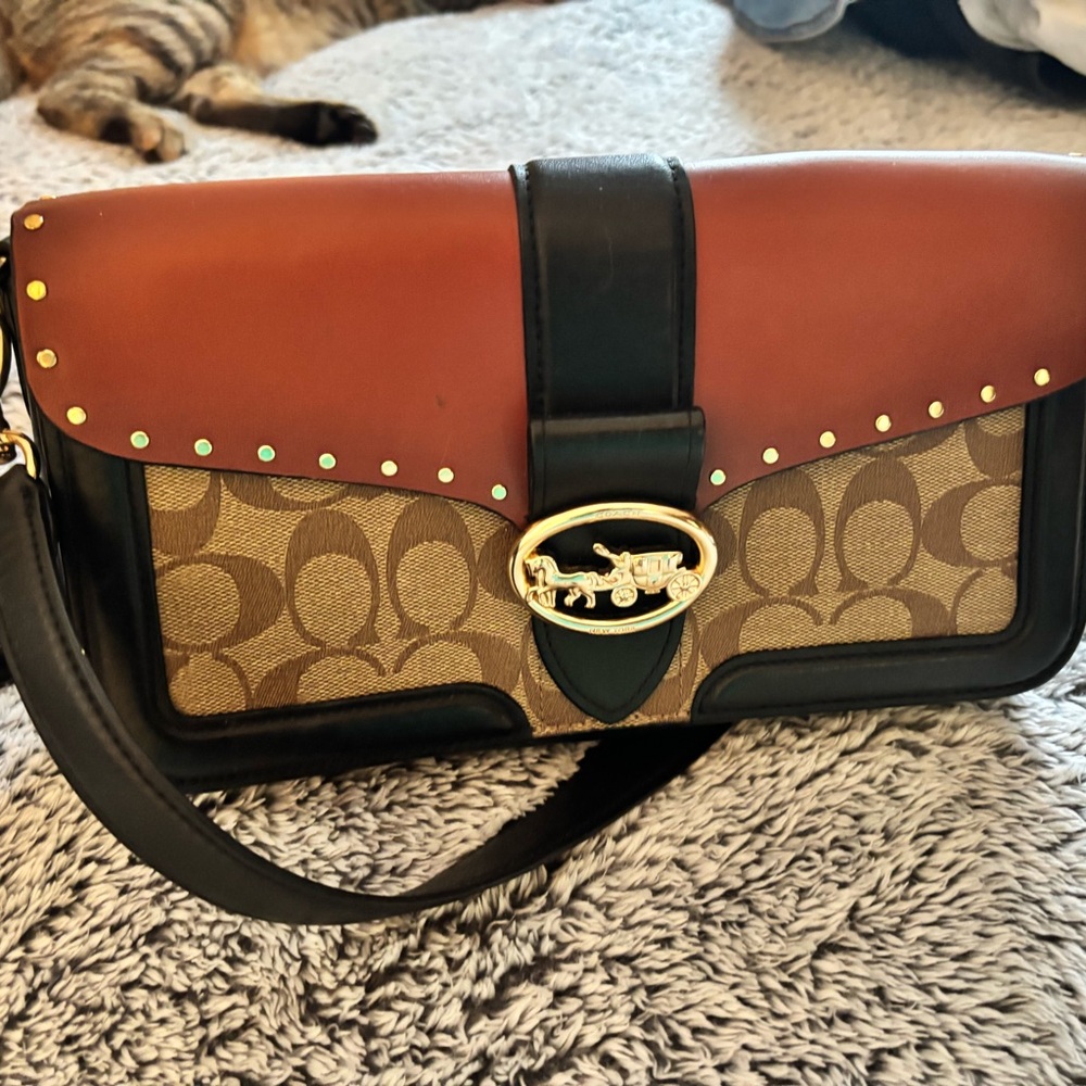 Coach Tan and Black Clutch with Gold Accents(pre loved)